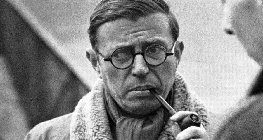 Jean-Paul Sartre smoking a pipe