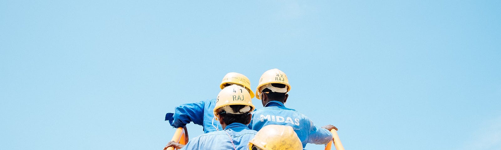 Workers climbing stairs.