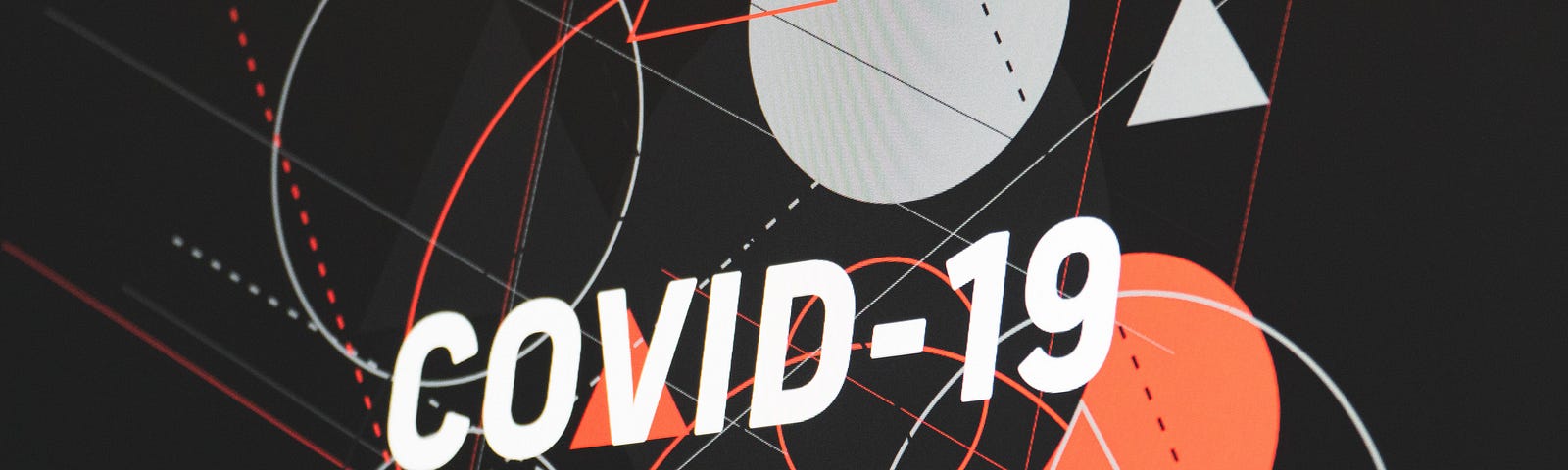 Text of “CoVID-19” on top of shapes in red and white