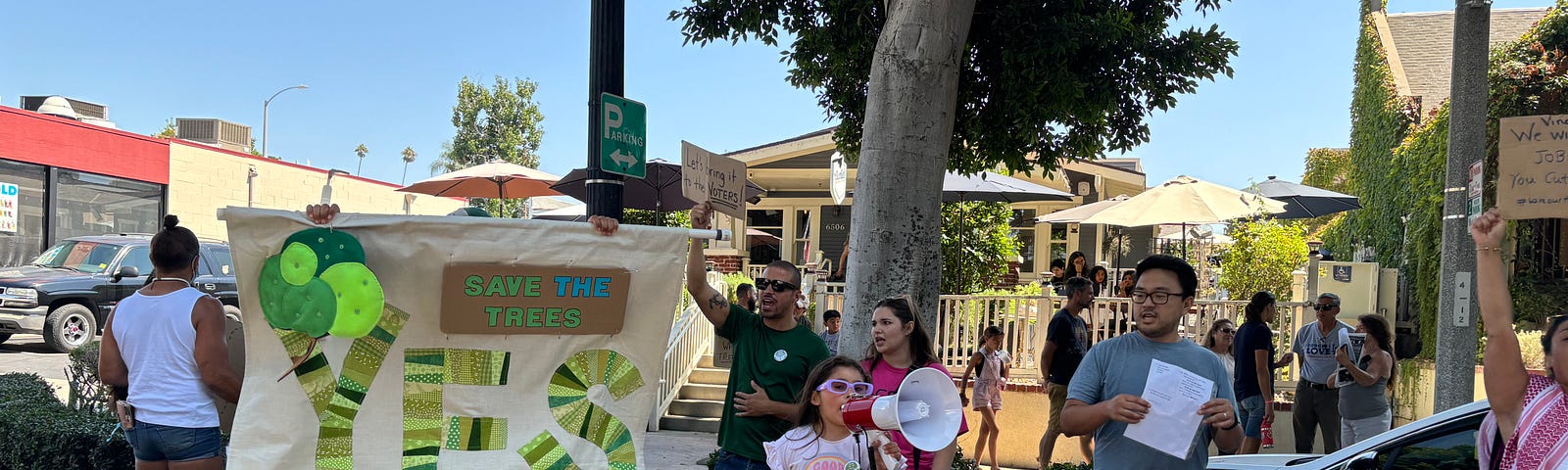 Whittier city residents as well as CodePink advocates protest in from of Aunties resturant in Uptown Whittier on Greenleaf Ave.