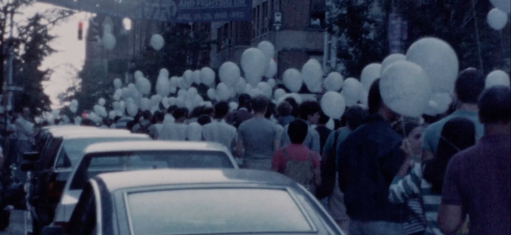 Still: Candlelight Vigil, New York, New York, 1988. Original format 16mm, color, silent.