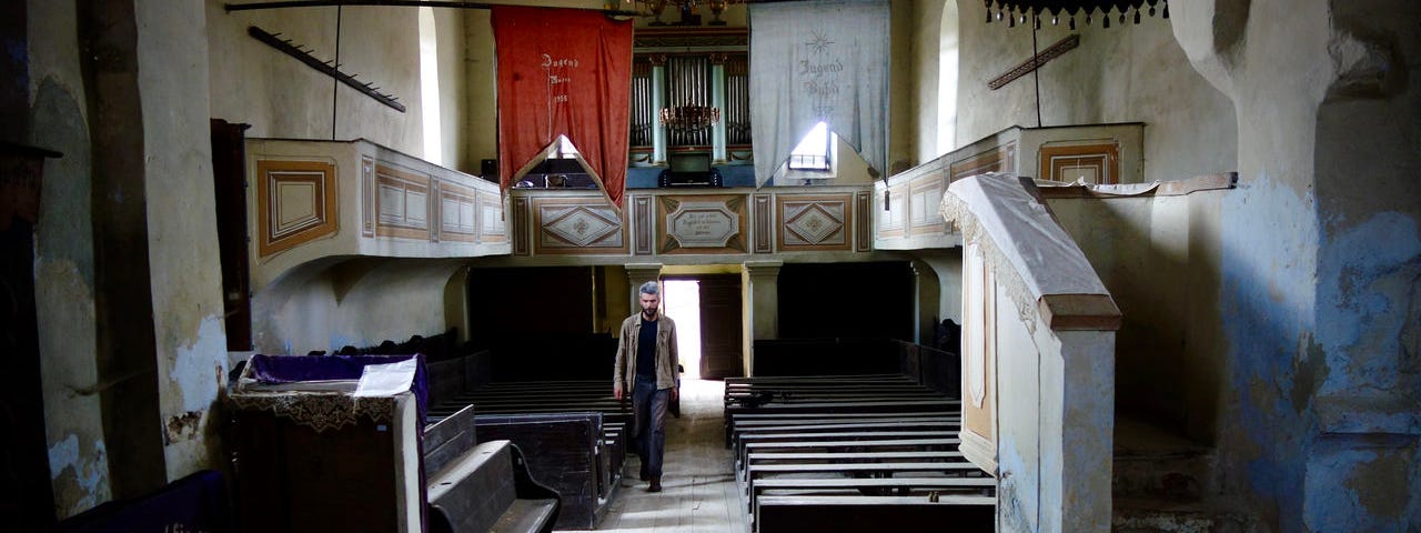 Stefan Fraunberger inside the church in Bussd, Transylvania; Photo: Johanna Guggenberger