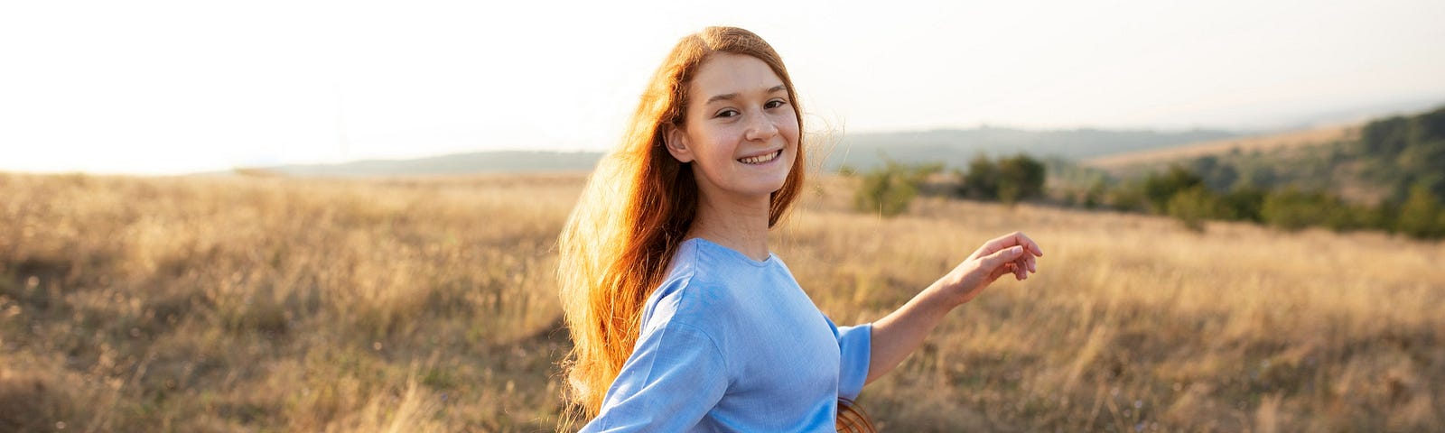 Image of smiley girl in nature