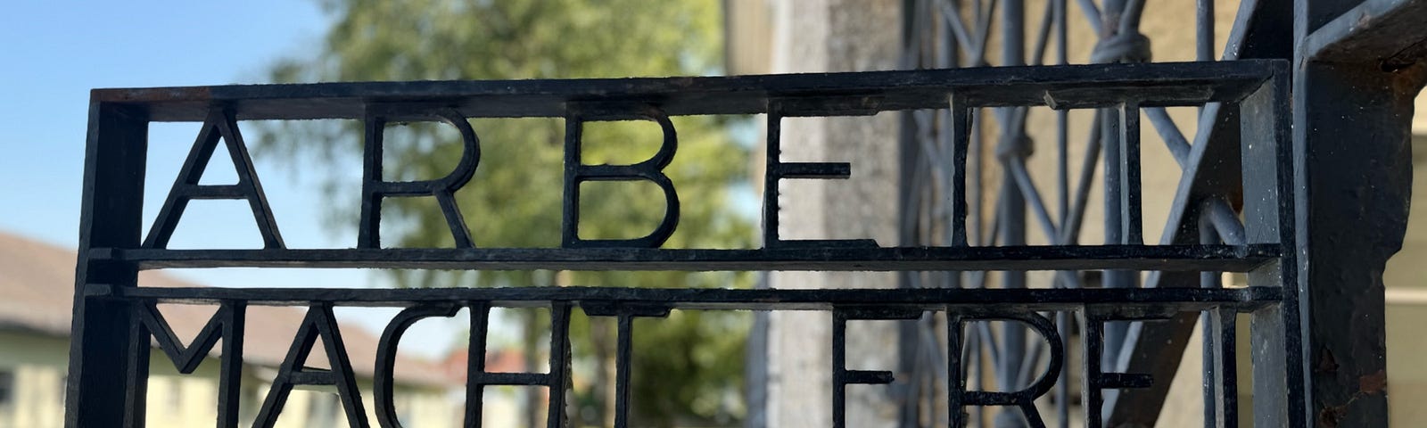 Arbeit Mach Frei iron gate at the entrance to Dachau concentration camp