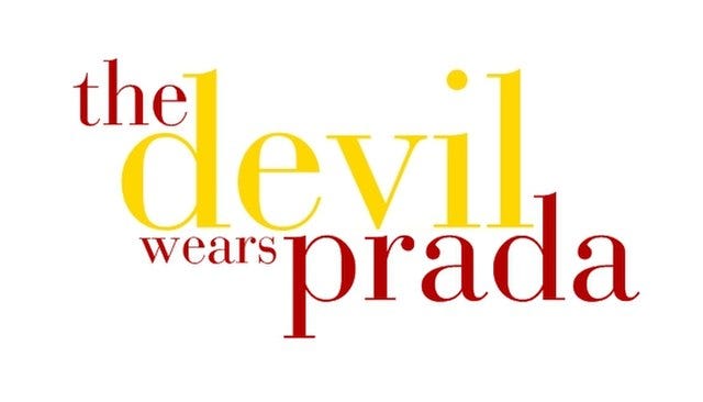 Red and yellow text rendering of “The Devil Wears Prada” title on a white background.