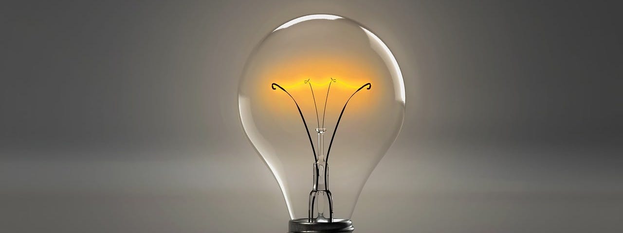color photo of a lightbulb floating in the air. Call for submissions