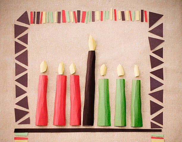 Kwanzaa candles. The black candle symbolizes the people, the three red candles are for the struggle and the three green candles represent the Earth.
