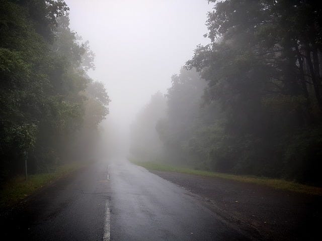 foggy road in the mountains