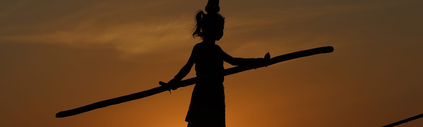 The Baunsa Rani which means “The Bamboo Queen” is an old Indian art form in which young girls walk on tightropes barefoot. The also often perform various acrobatic postures on the rope. This dance form is very dangerous and requires many years of experience. Understanding comes with balance.