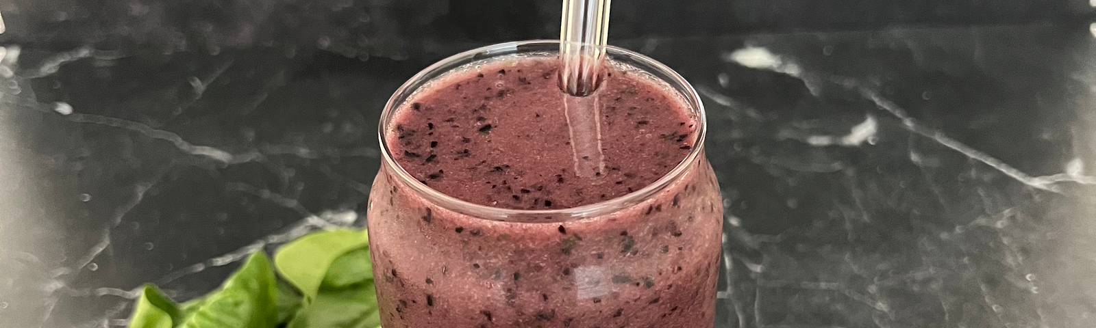 Blueberry smoothie on a marble countertop