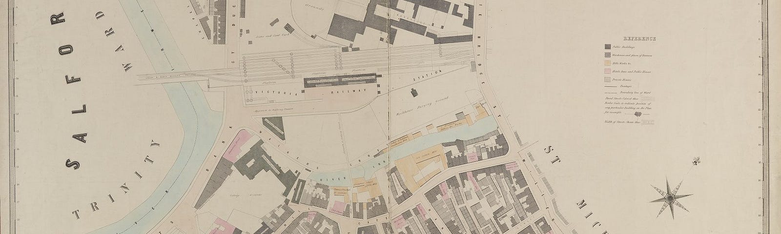 A very detailed map showing central Manchester in 1851, featuring Manchester Cathedral and Victoria Railway station. Public houses are coloured pink and mills and industrial works are coloured orange.