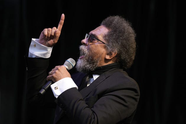Dr. Cornel West pointing straight up.