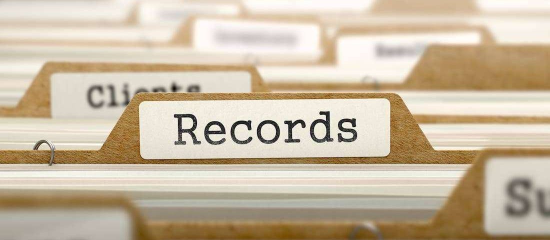 A cabinet of files. In one tab it's possible to read "records".