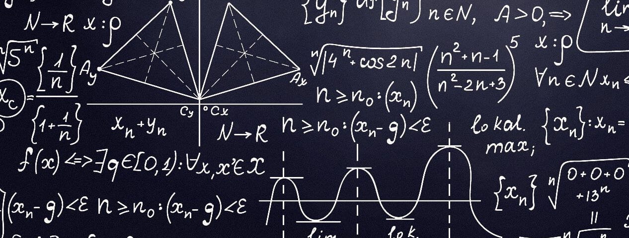 Blackboard with mathematical formulas.