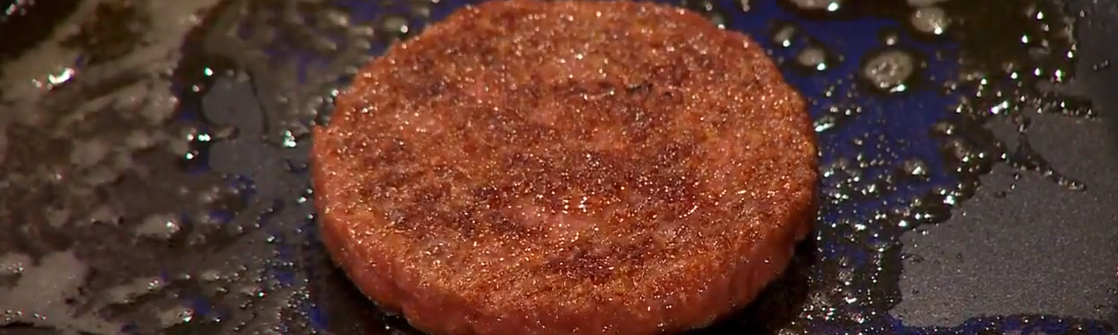 IMAGE: First cultured hamburger fried