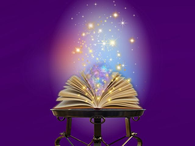A open spell book sitting on a book stool, with spells’ energy arising from the pages.