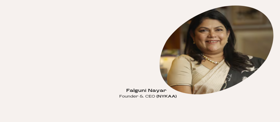 Falguni Nayar, Founder and CEO of Nykaa, smiles warmly in a traditional saree, representing her successful journey in revolutionizing India’s beauty industry.