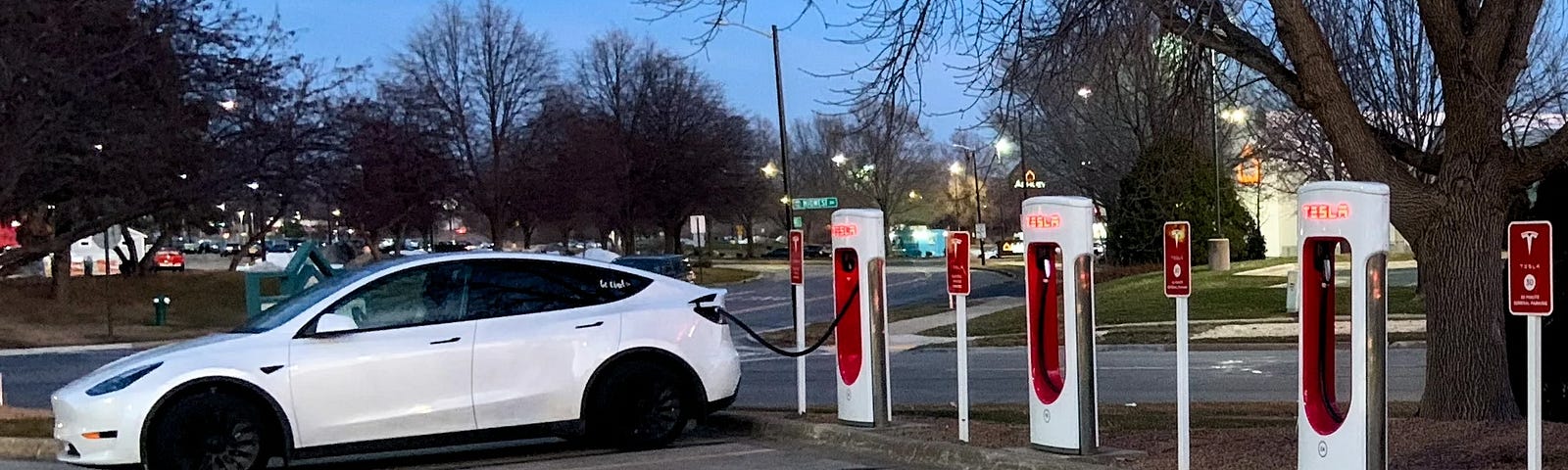 IMAGE: A Tesla charging in a supercharger