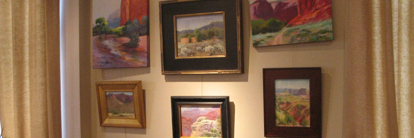 Western artwork on the wall of a show - photo by the author Marsha Hamby Savage