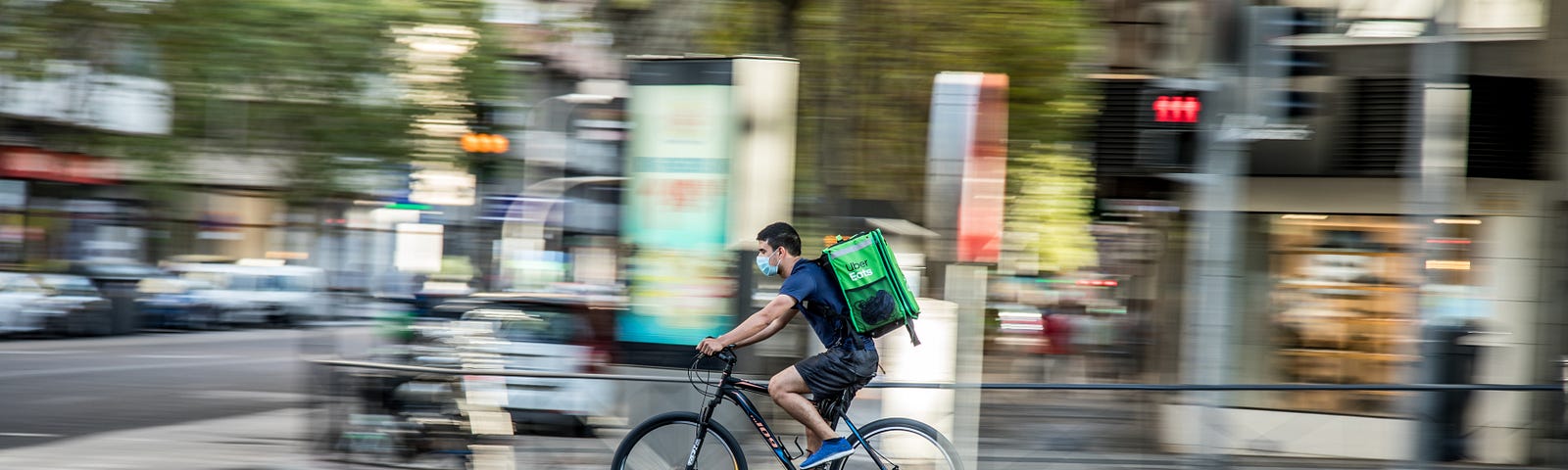Rider on wheels, delivering food.
