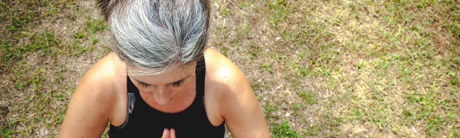 Woman sat in a meditation pose