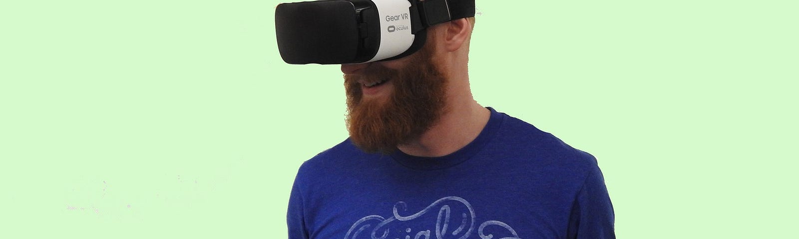 a guy wearing a virtual reality headpiece to illustrate an article by Tree Langdon on Technology Hits