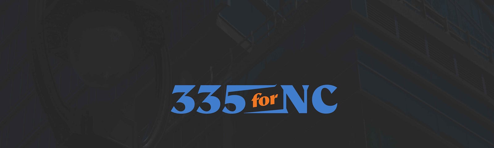 A photo of a building in Raleigh, North Carolina with the 335 for NC logo overlaid on the image.