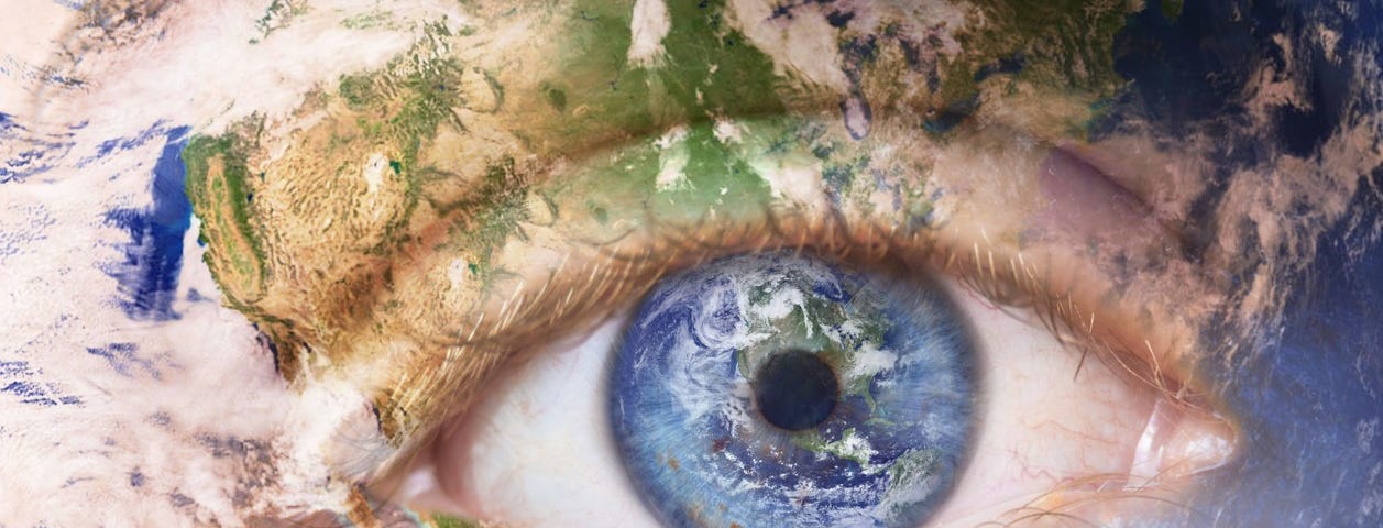 A human eye sits over planet Earth as background.