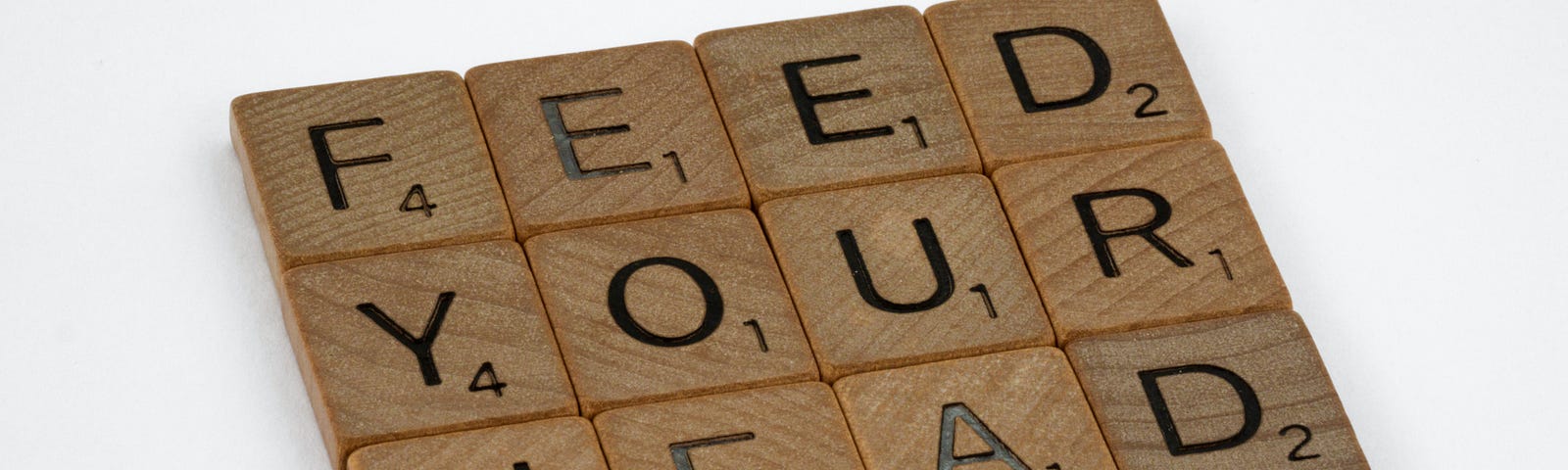 Picture showing scrabble stones spelling the text ‘feed your head’