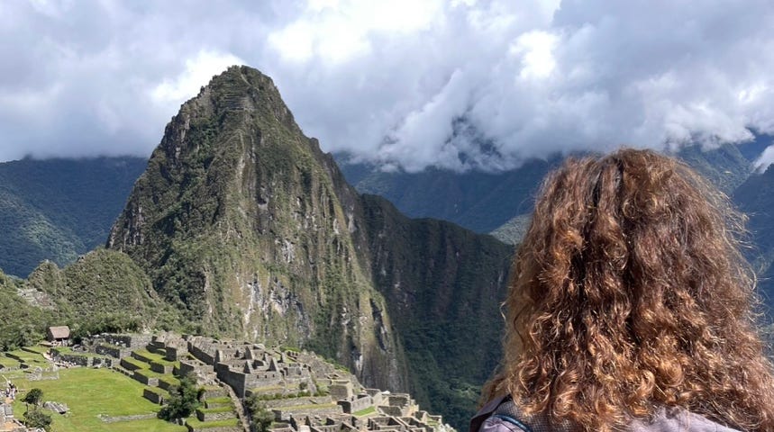 Photo of the author from behind, looking out over Machu Picchu.