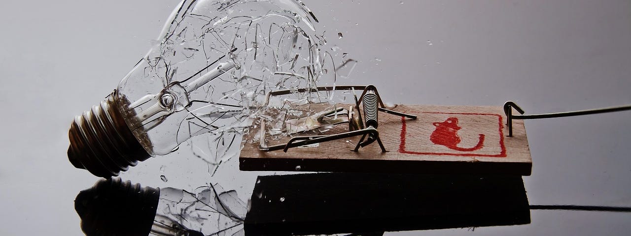 IMAGE: A lightbulb broken by the activation of a classic mousetrap