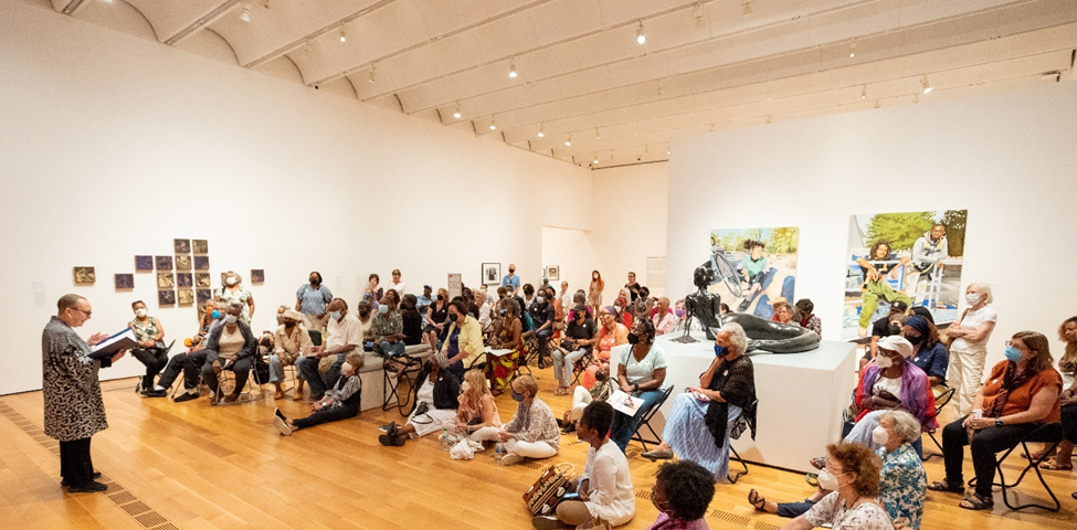 Attendees enjoy a reading by Pearl Cleage at 2022’s Lifelong Learning Celebration in the High’s galleries.