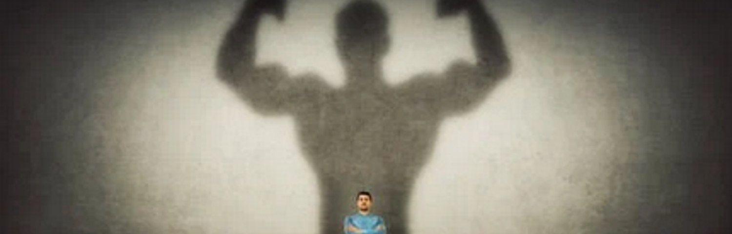 strongman shadow and male image