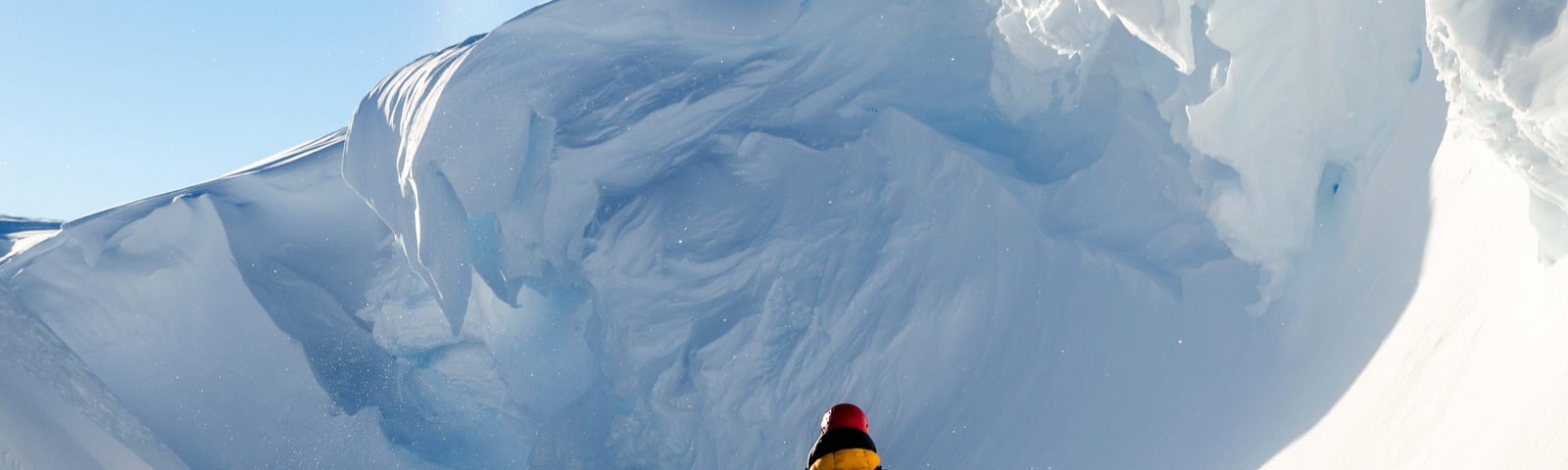 two people walking in the ice