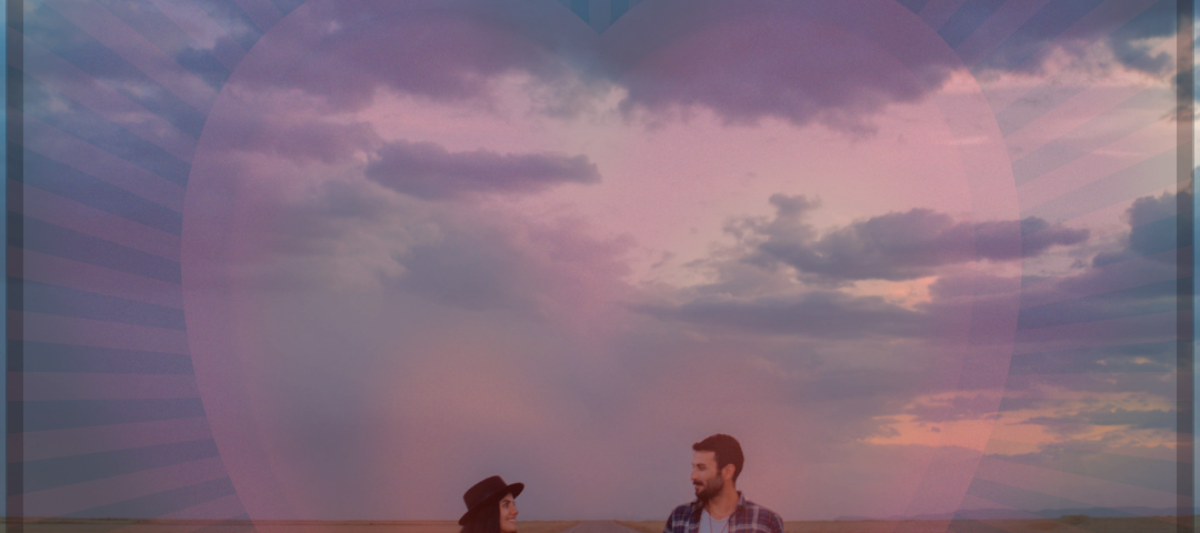 A couple holding each others hands walking on a road