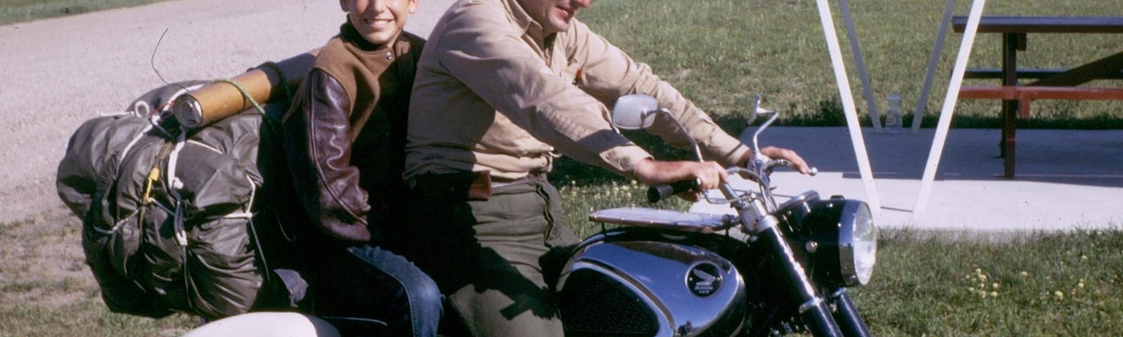 Robert Pirsig and his son Chris on the Honda Superhawk motorbike