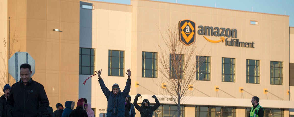 Workers in Shakopee protesting their working conditions at an Amazon fulfillment center. Photo credit: Fibonacci Blue