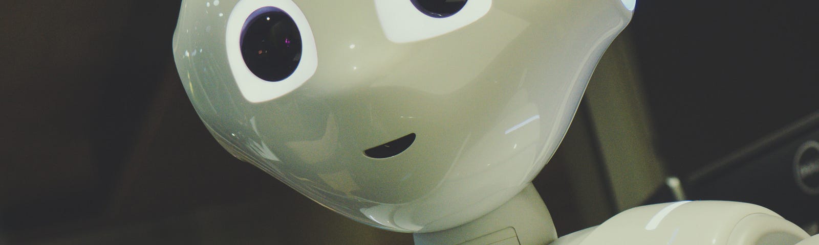 Robot with human features, smiling