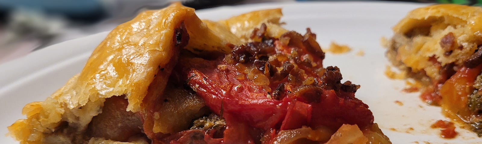 Slice of tomato galette / tomato tart