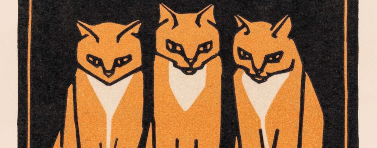 White, orange, and black woodcut print of three orange tuxedo cats sitting next to each other.