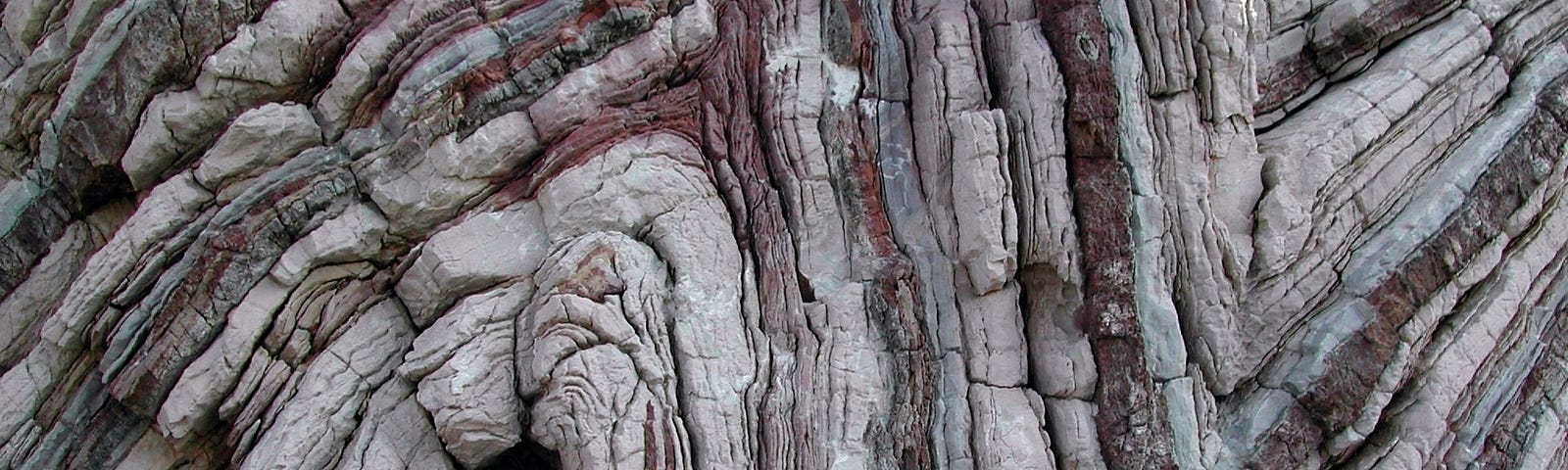 layers of rocks that have been folded by pressure over millenia.