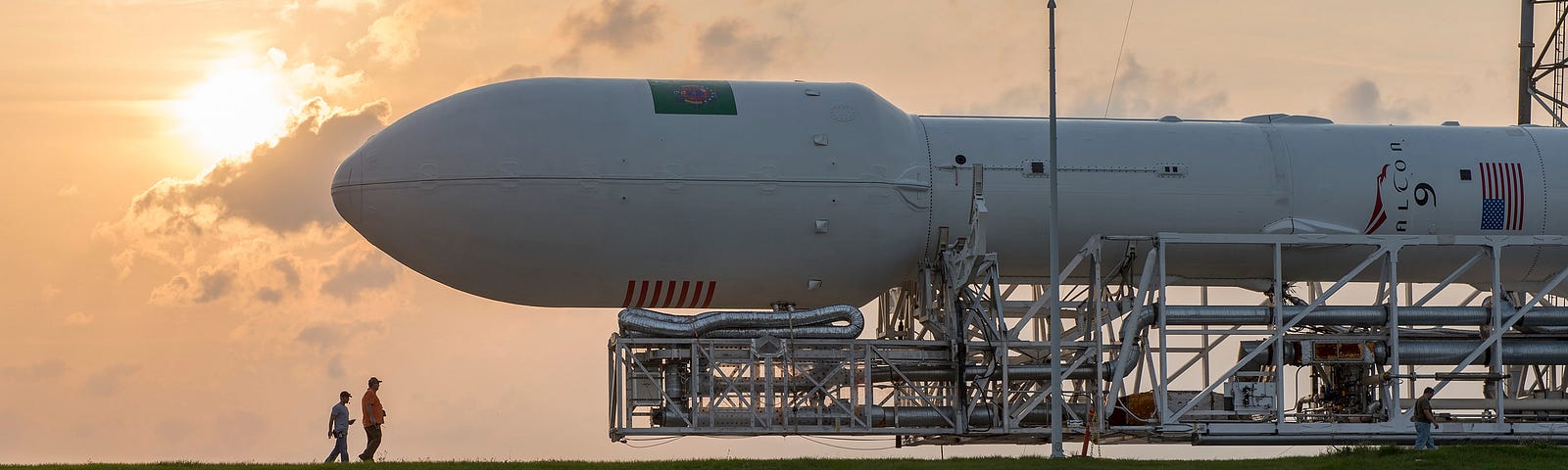 Rolling out a Space X Falcon 9 launch vehicle.