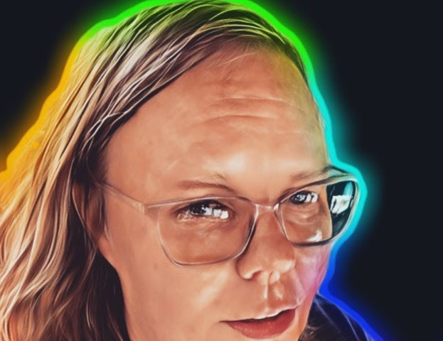 A colorful, stylized and slightly smudgy portrait of a woman with brown hair, freckly skin and glasses.