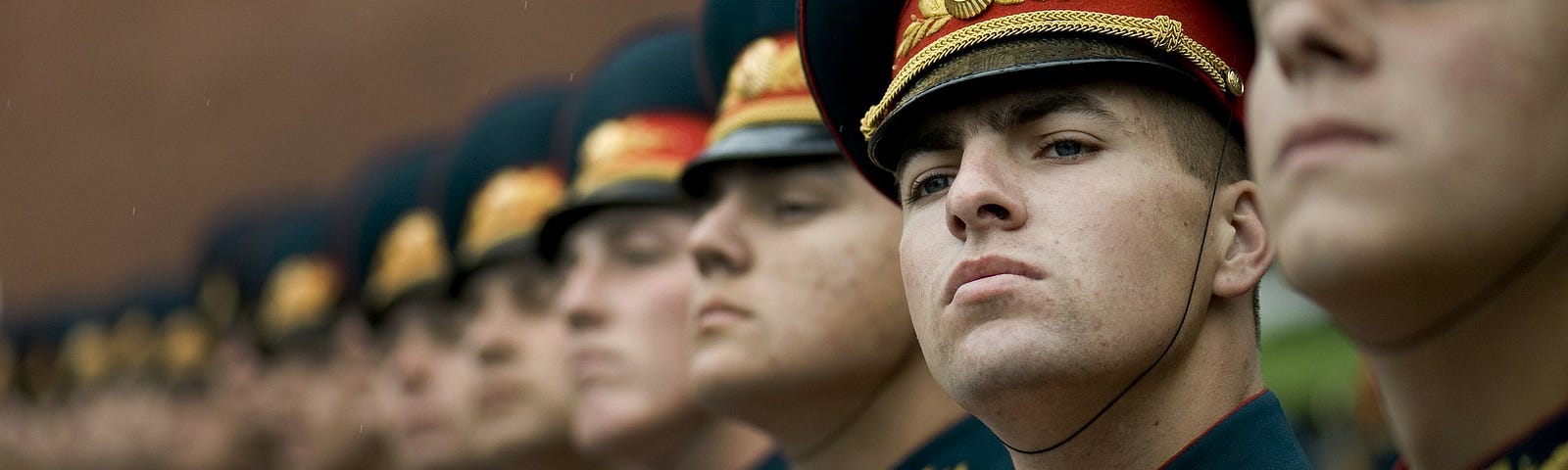 Russian soldiers standing in pensive mood