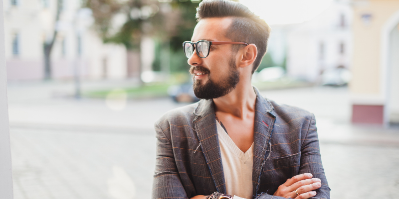 Bearded man with glasses looking to the side — The Surprising Reason Most Women Can’t Find A Good Man