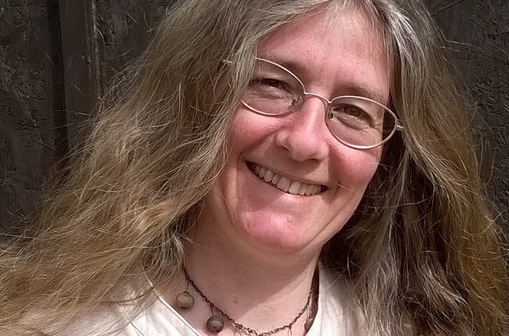 Photo of the writer Mandy Haggith, smiling at the camera