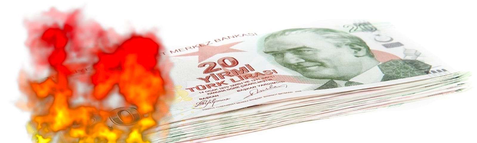 IMAGE: A stack or Turkish lira bank notes burning