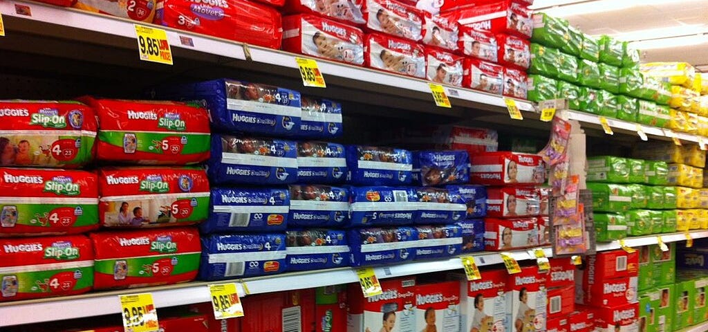 Rows of disposable diapers in a supermarket