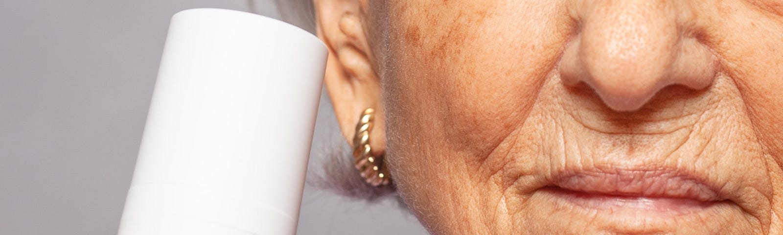 Woman holding anti-ageing secret formula