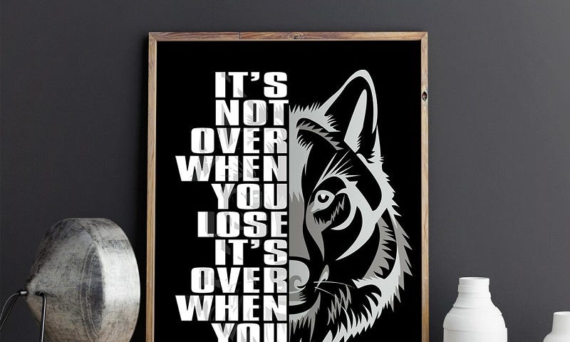 Wolf Warrior Quote “It’s Not Over When You Lose, It’s Over When You Quit” Image.